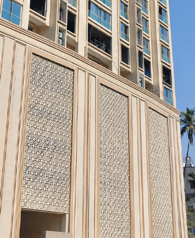 Modern building facade with geometric jali panel cladding for ventilation and design